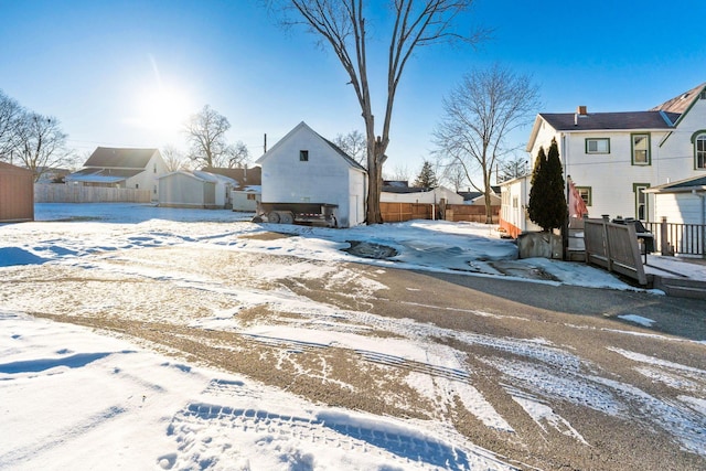 view of yard layered in snow