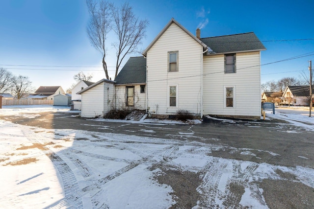 view of snow covered property