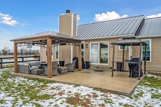 exterior space with a patio area, outdoor lounge area, and a gazebo