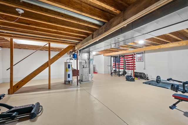 basement featuring water heater and heating unit