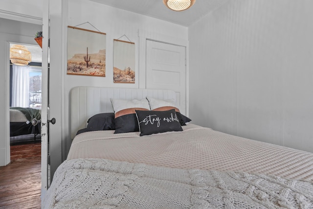 bedroom with wood-type flooring