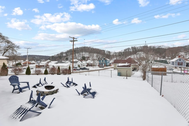 view of home's community featuring a fire pit