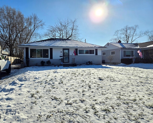 view of snow covered property