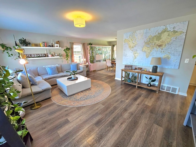 living room with dark wood-type flooring