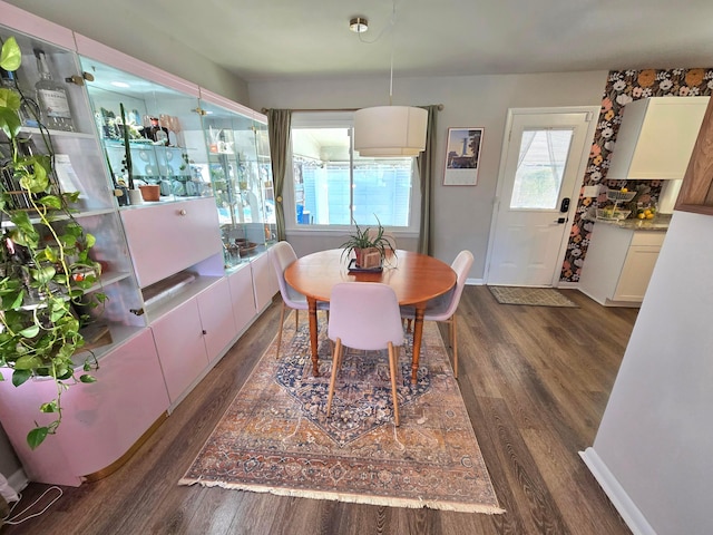 dining room featuring dark hardwood / wood-style floors