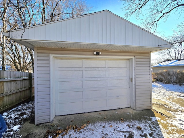 view of snow covered garage