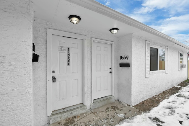 entrance to property with cooling unit