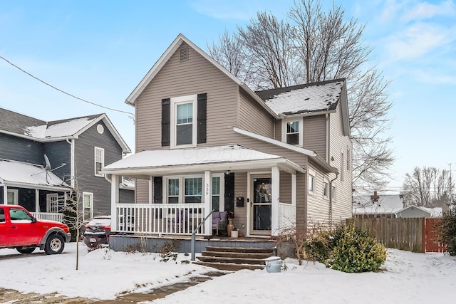 view of front property featuring a porch