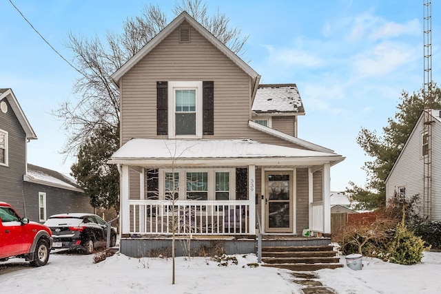 view of property with a porch