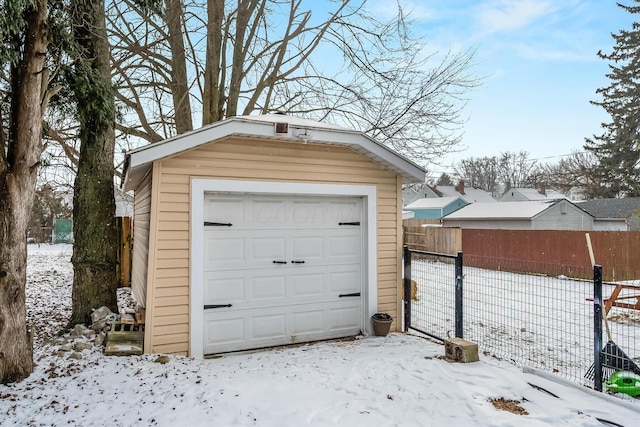 view of snow covered garage