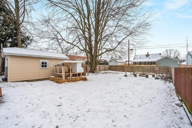 view of yard covered in snow