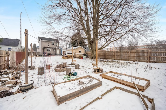 view of yard layered in snow