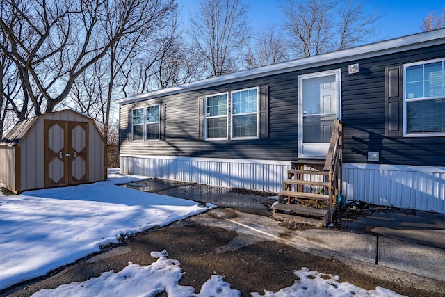 exterior space with a storage shed