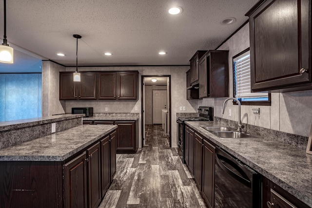 kitchen with a textured ceiling, dark brown cabinetry, black appliances, decorative light fixtures, and sink