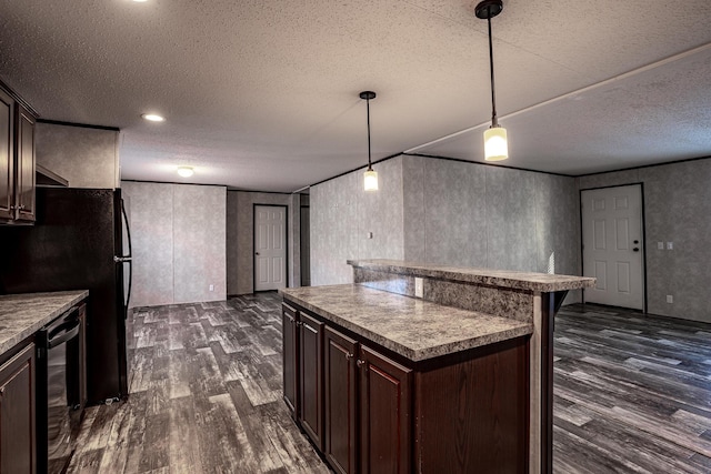 kitchen featuring dark brown cabinetry, a center island, black dishwasher, a kitchen breakfast bar, and hanging light fixtures