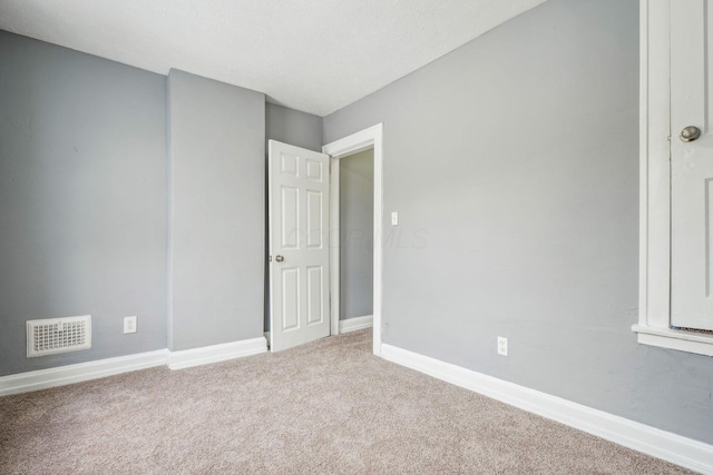 empty room with light carpet