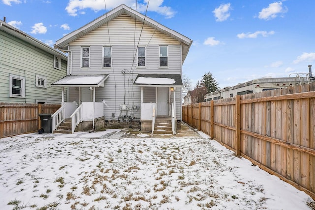 view of snow covered property