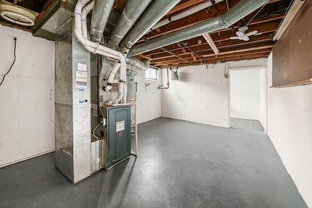 basement with water heater and heating unit