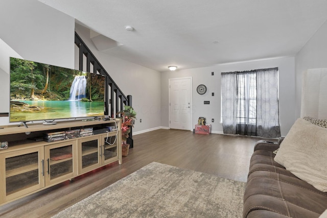 living room with dark hardwood / wood-style floors