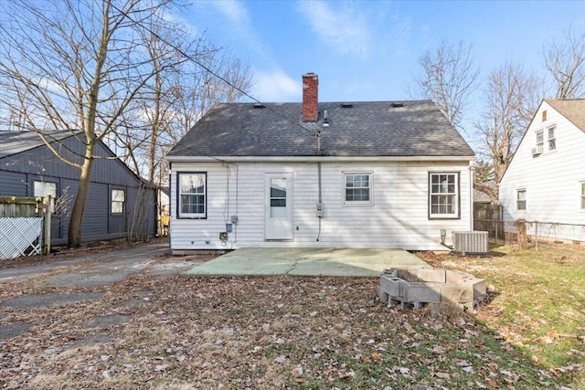 back of property featuring central AC and a patio