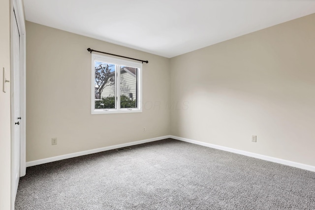 empty room with carpet floors