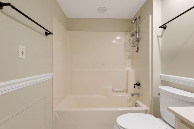 full bathroom featuring vanity, shower / bathtub combination, and toilet