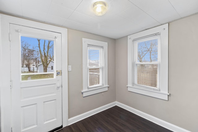 doorway featuring dark hardwood / wood-style flooring