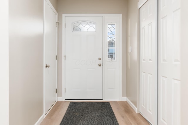 entryway with light hardwood / wood-style flooring