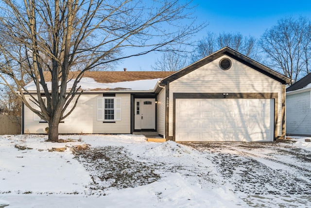 ranch-style house featuring a garage