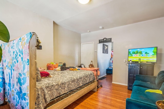 bedroom featuring light wood-type flooring