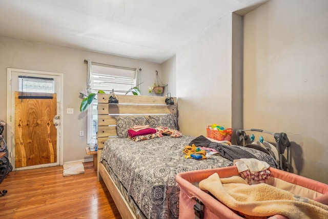 bedroom with light hardwood / wood-style flooring