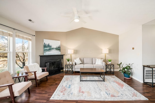 living room featuring vaulted ceiling, ceiling fan, beverage cooler, and dark hardwood / wood-style flooring