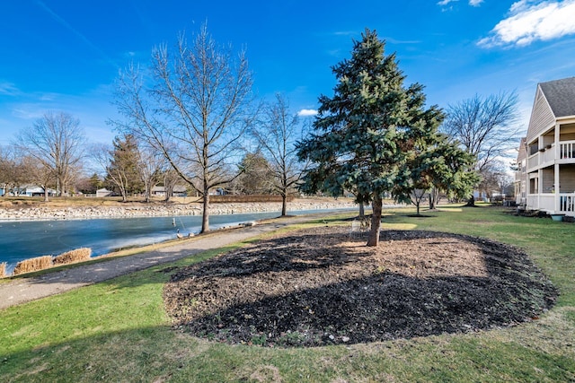 view of yard with a water view