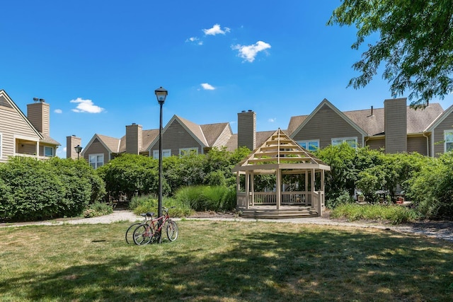 view of community featuring a gazebo and a yard