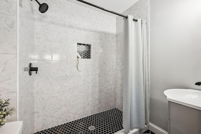 bathroom with toilet and a shower with shower curtain