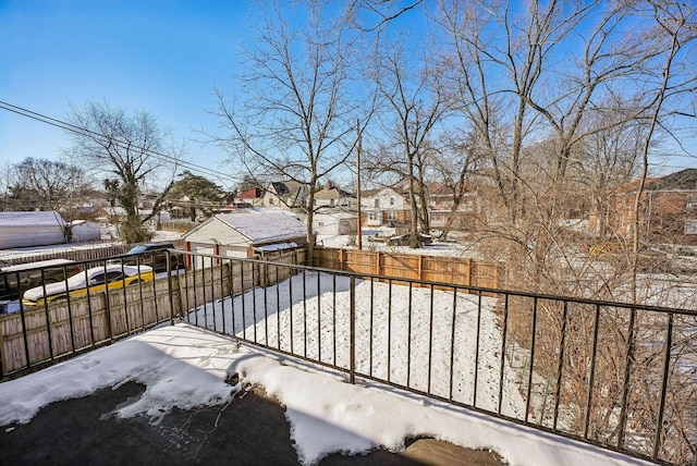 view of snow covered deck