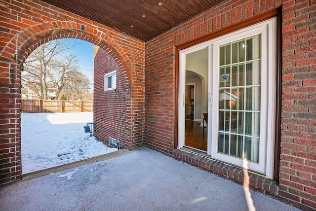 view of snow covered patio