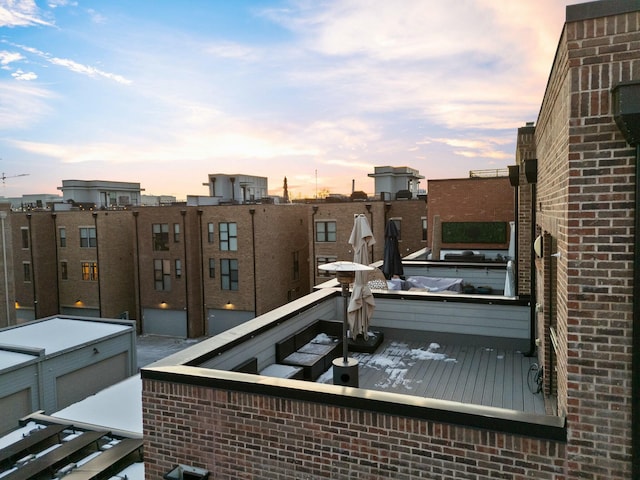 view of balcony at dusk