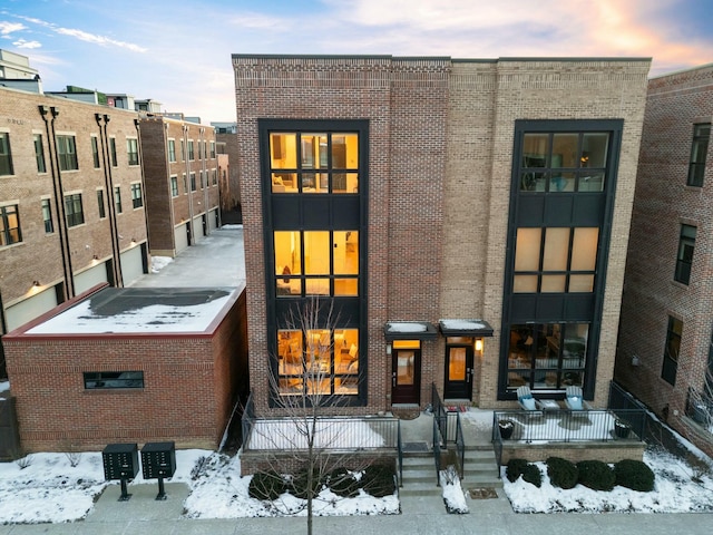 view of snow covered property