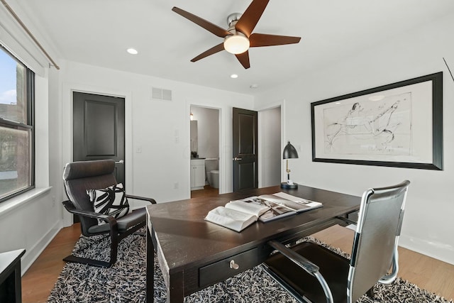 office area featuring hardwood / wood-style floors and ceiling fan