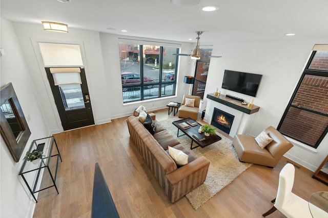 living room with light hardwood / wood-style flooring