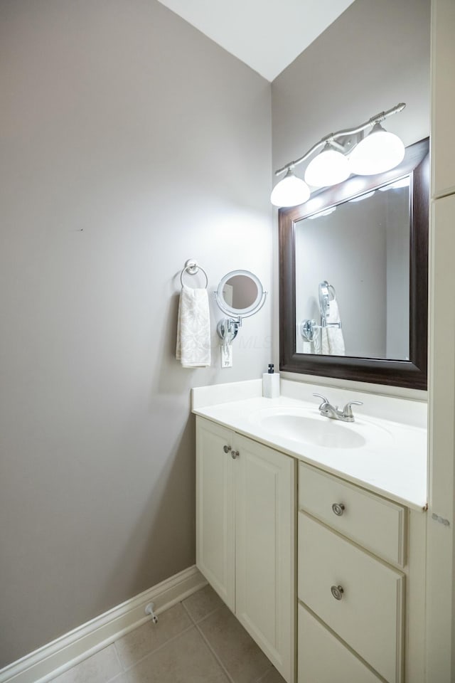 bathroom featuring vanity and tile patterned flooring