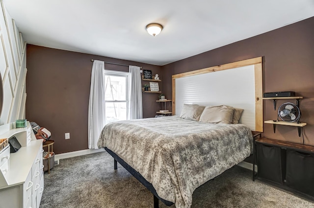 bedroom with dark carpet