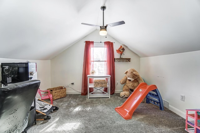 interior space featuring carpet floors, ceiling fan, and vaulted ceiling