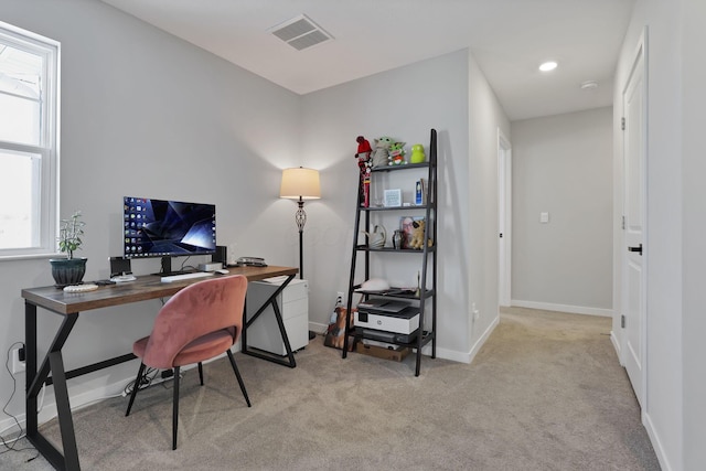 office space with light carpet