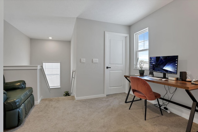 office area featuring light colored carpet