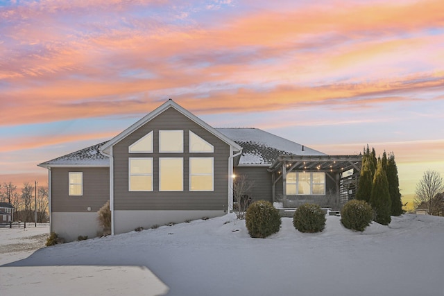 view of snow covered property