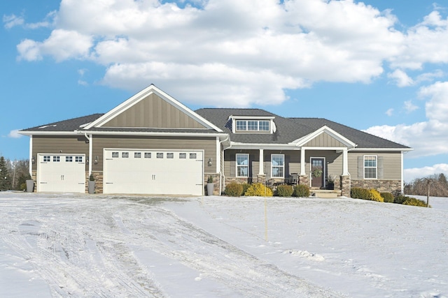 craftsman house featuring a garage and covered porch