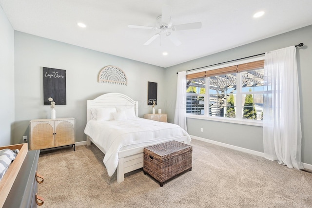 bedroom with ceiling fan and carpet flooring