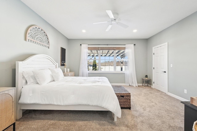 carpeted bedroom featuring ceiling fan